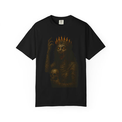 Black t-shirt featuring a gothic horror design of a crowned undead queen with glowing red eyes, holding a human skull and wearing a flaming crown; the graphic is intense, cinematic, and perfect for fans of horror, punk, and heavy metal aesthetics.