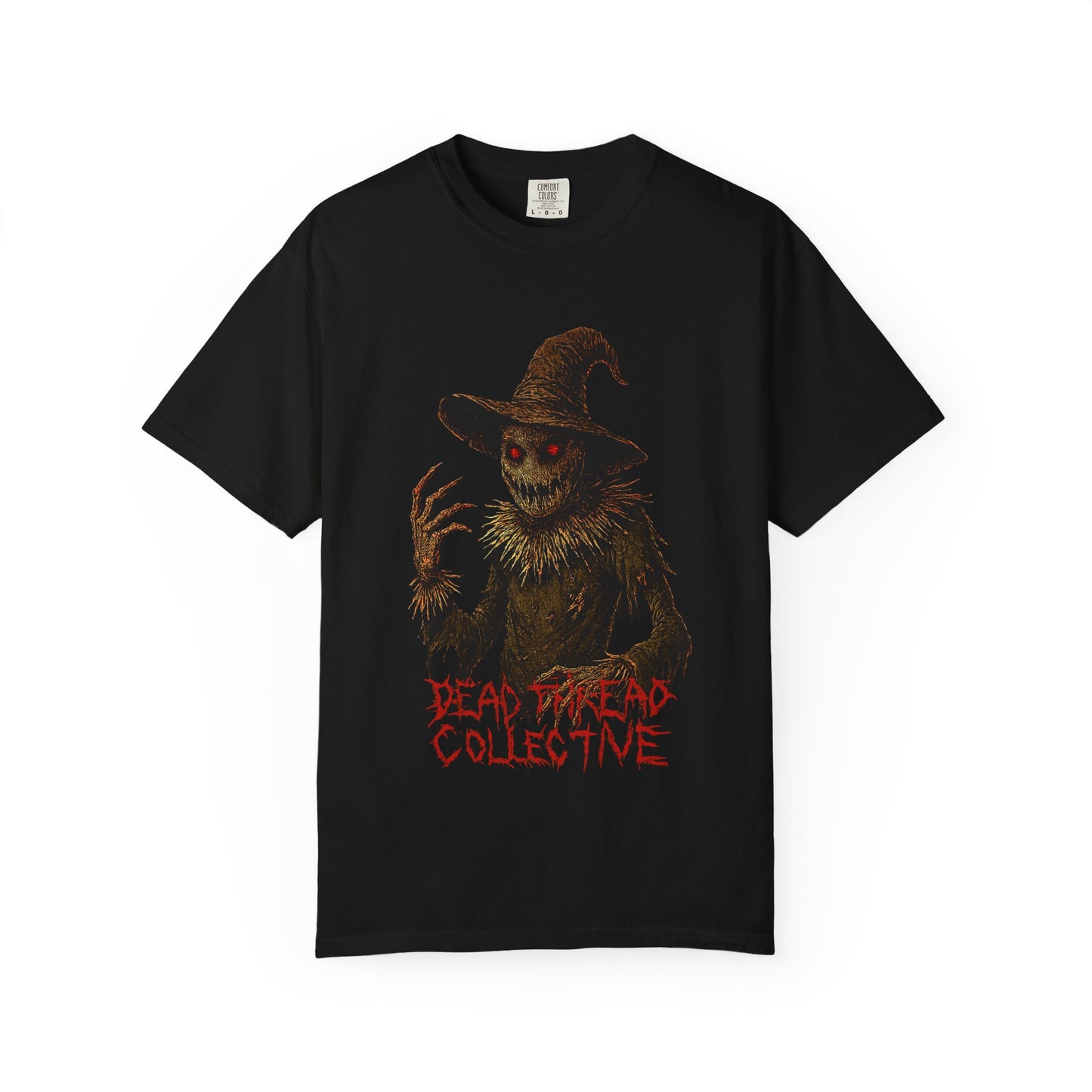 Black t-shirt featuring a terrifying scarecrow with glowing red eyes, jagged claws, and a twisted grin, wearing a tattered hat and outfit; beneath the figure, the words "DEAD DREAD COLLECTIVE" appear in jagged red font, evoking a gothic horror vibe.