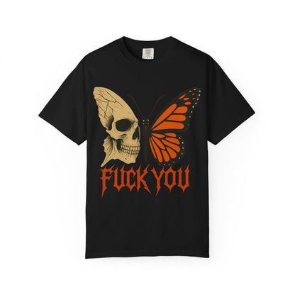 Black t-shirt featuring a graphic of a skull fused with a butterfly wing; left side shows a detailed human skull, right side displays a vibrant orange and black butterfly wing; bold red text below reads "FUCK YOU"; design evokes themes of death, beauty, rebellion, and horror.
