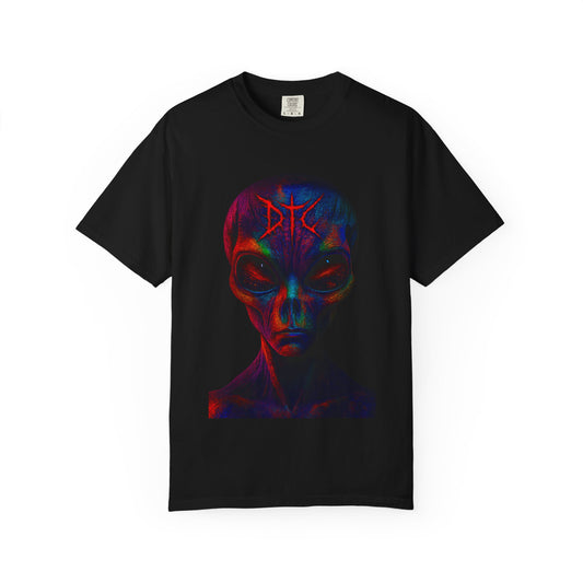 Black t-shirt featuring a glowing alien head in red, blue, and purple tones with a stern expression and stylized "DTC" symbol above its forehead; vibrant sci-fi horror design centered on the chest.